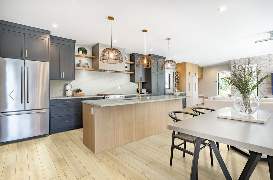 Lanston Oak Flooring featured in a transitional style kitchen and dining space