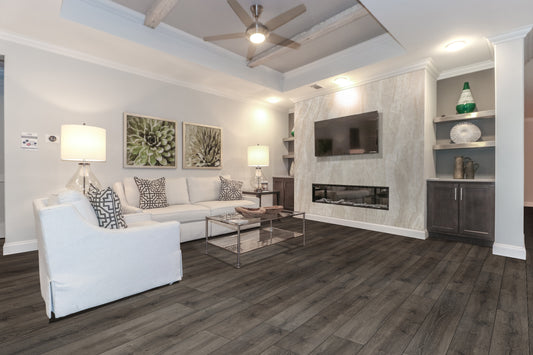 Prescott Walnut Waves Luxury Vinyl Plank Flooring featured in a transitional living room