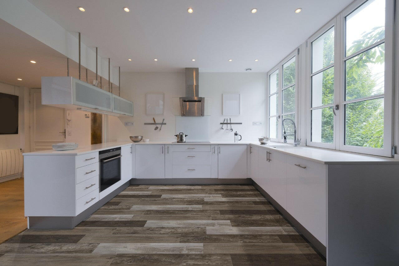 MSI Cyrus Weathered Brina - Luxury Vinyl Flooring featured in a galley kitchen